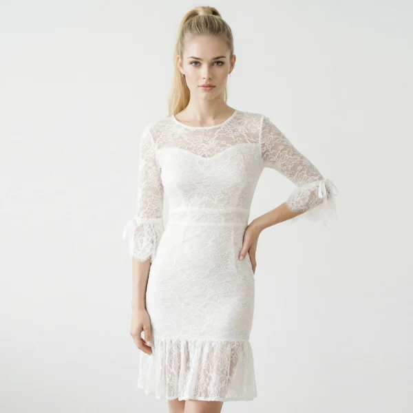 MANGANO – Vestito bianco Rahia  ricamato con maniche a fiocco